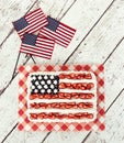 Patriotic American flag cake with mini flags Royalty Free Stock Photo