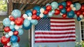 Patriotic American Flag Display with Red, White, and Blue Balloons Royalty Free Stock Photo