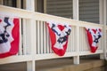 Patriotic Bunting Hanging from Front Porch Royalty Free Stock Photo