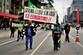 Patriotic couple with the banner: `We want an election without fraud, shoo communism!` in the Manifestation