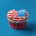 a patriotic cupcake with an american flag heart