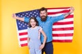 Patriotic fourth of july. Patriotic family celebrating independence day. Bearded man and small child showing patriotic