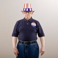 Patriotic man in American flag hat Royalty Free Stock Photo