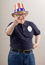 Patriotic man in American flag hat Royalty Free Stock Photo