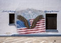 Patriotic mural by Jerod Davies next to the police station in historic downtown Denison, Texas.