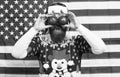 Patriotic surprise. Surprised hipster hold baubles as glasses. Bearded man look with surprise. Santas surprise