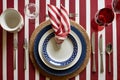 Patriotic table setting with American flag Independence Day. View from above. Generative AI.