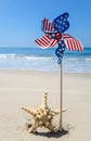 Patriotic USA background with starfish on the sandy beach Royalty Free Stock Photo