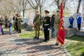 Patriotic youth stand in the guard of honor with a regimental colour in the Victory Memorial during the celebration of Victory Day