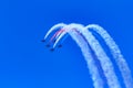 Patriots Jet Team aerobatic team Aero L-39 Albatros jets in formation with colorful contrails, San Francisco Fleet Week Royalty Free Stock Photo