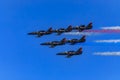 Patriots Jet Team aerobatic team Aero L-39 Albatros jets in formation with colorful contrails, San Francisco Fleet Week