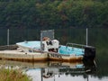 Patrol Boat at Dock on Tranquil Lake