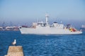 Patrol boat and sea port Varna, Bulgaria. Industrial cranes, ships and boats on the harbour