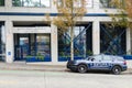 Patrol car parked outside Seattle Police Department East Precinct building