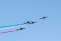 The patrol of France, french national day, blue white red flag, planes, acrobatic figures, blue sky, military parade