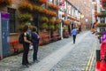 Patrons outside the historic Duke of York pub in Commercial Lane in Belfast, Northern Ireland.