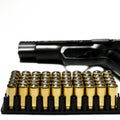 Patrons for a traumatic pistol stand in a black plastic form for cartridges. Weapons