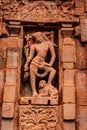 Pattadakal famous hair style sculptures of hindu gods on facade of 7th century temple carved walls Royalty Free Stock Photo