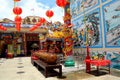 Chinese temple with urns art and red lanterns and Thai flag Pattani Thailand Royalty Free Stock Photo