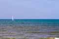 Seascape calm sea ocean with a boat sailing