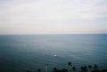 Pattaya sea in the morning Taken with a film camera from the corner of the room of the Divaree Hotel, Jomtien, Pattaya, Thailand.