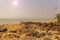 PATTAYA,THAILAND - APRIL 20,2018: Coral beach This is a small beach with many rocks and stones.