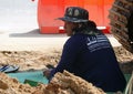 Construction site worker taking a smoke break Royalty Free Stock Photo