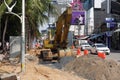 Excavator on construction site on Beach Street, Pattaya, Thailand