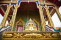 Figurine of Buddha on the background of a Wat Nong Yai temple Royalty Free Stock Photo