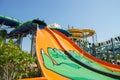 Bottom view of the large slides in the water park in the summer