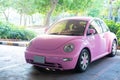 Pattaya, Thailand - May 27, 2019: Modern fun pink small car. Photo of a modern funky pink car parked close to the sea