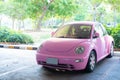 Pattaya, Thailand - May 27, 2019: Modern fun pink small car. Photo of a modern funky pink car parked close to the sea