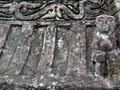 Pattern of ancient carving on the stone grave of waruga