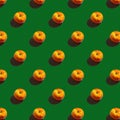 pattern apples on a green background with shadows, a repeating picture wallpaper or background on a smartphone
