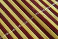 pattern of bamboo spokes which yellow and brown Royalty Free Stock Photo