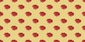 Pattern of bananas. fresh red banana isolated on yellow background Royalty Free Stock Photo