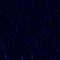 A pattern of blue gradient raindrop shapes on a dark background. The raindrops vary Royalty Free Stock Photo