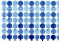 Pattern of blue watercolor circles arranged in a grid on a white background. The circles vary in Royalty Free Stock Photo