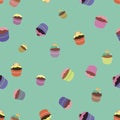 Pattern with bright cupcakes