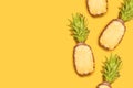 Pattern with bright pineapples on yellow background. Top View Royalty Free Stock Photo