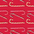 Pattern of candy canes lollipops Christmas on a red background. Royalty Free Stock Photo