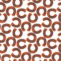 A pattern of cartoon horseshoes in brown shades on a white background. Themes of westerns, cowboys, horses, luck, wild