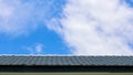 Pattern of a classic roof and the blue sky. Royalty Free Stock Photo
