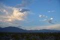 Pattern of clouds over hills and mountain range in the Mojave Desert Royalty Free Stock Photo