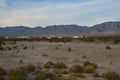 Pattern of clouds over hills and mountain range in the Mojave Desert Royalty Free Stock Photo