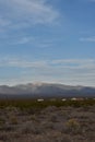 Pattern of clouds over hills and mountain range in the Mojave Desert Royalty Free Stock Photo