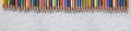 Pattern of color pencils on white background. Close up Royalty Free Stock Photo