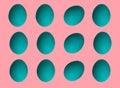 Pattern of colored chicken eggs isolated on pastel background. Top view. Minimalistic design Royalty Free Stock Photo