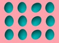 Pattern of colored chicken eggs isolated on pastel background. Top view. Minimalistic design