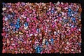 Pattern of colored stones or tiles pink blue brown or path for design on the dark background Royalty Free Stock Photo